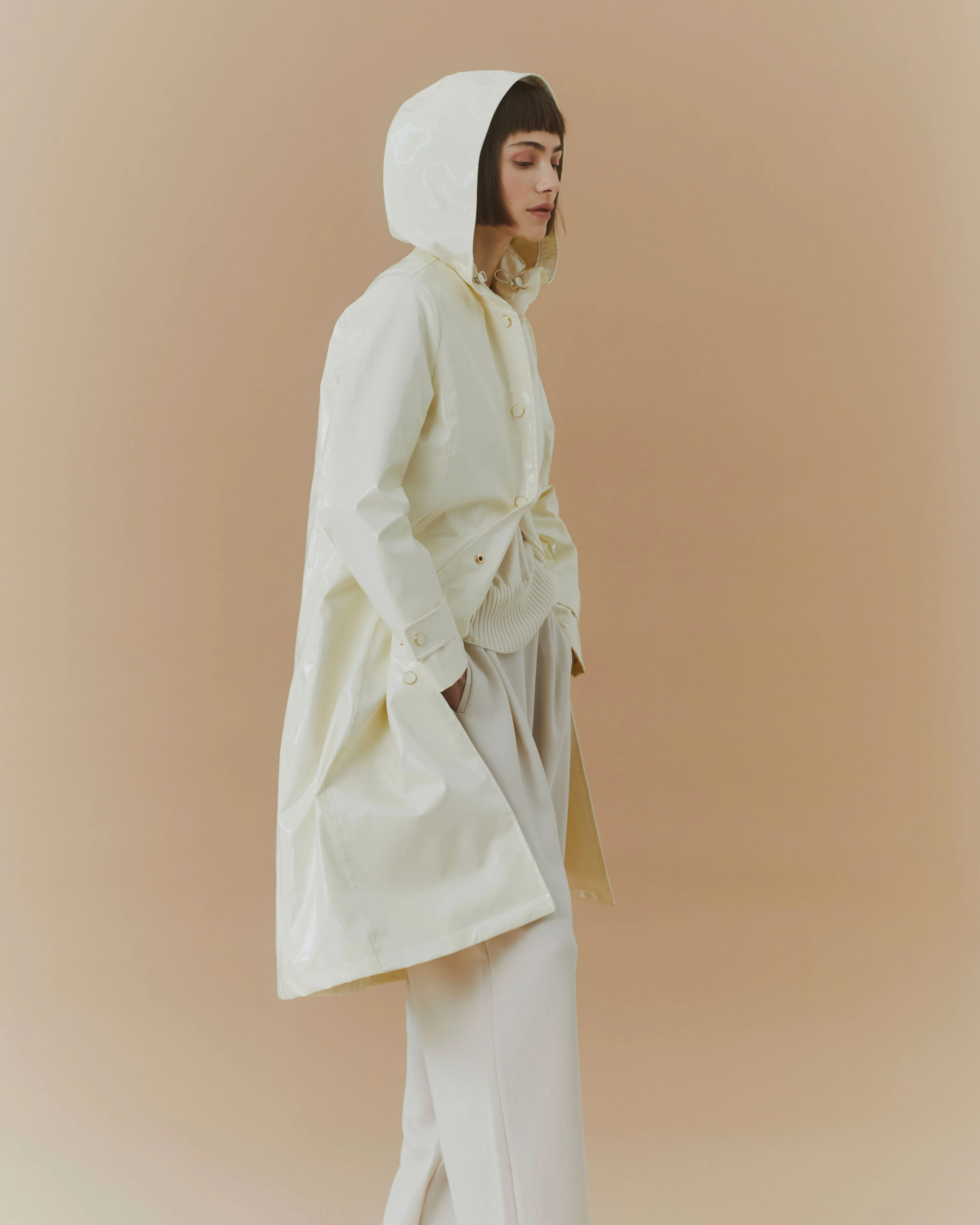 Mid Length hooded slicker coat with detachable quilted liner - Daisy White